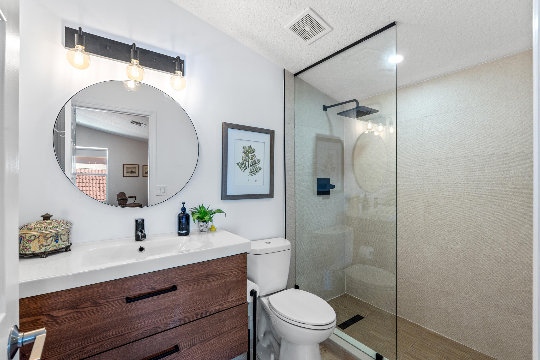 1084 Anchor Point Delray Beach, FL 33444 - Photo 9 of 25 a bathroom with a sink mirror and toilet