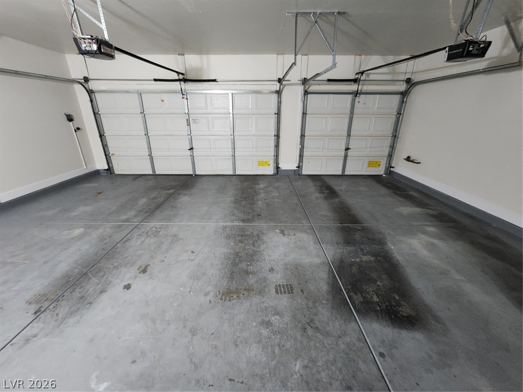 716 Sharon Hills Street Henderson, NV 89052 - Photo 55 of 66 Garage with a garage door opener