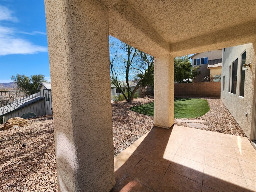 716 Sharon Hills Street Henderson, NV 89052 - Photo 57 of 66 Fenced backyard with a patio