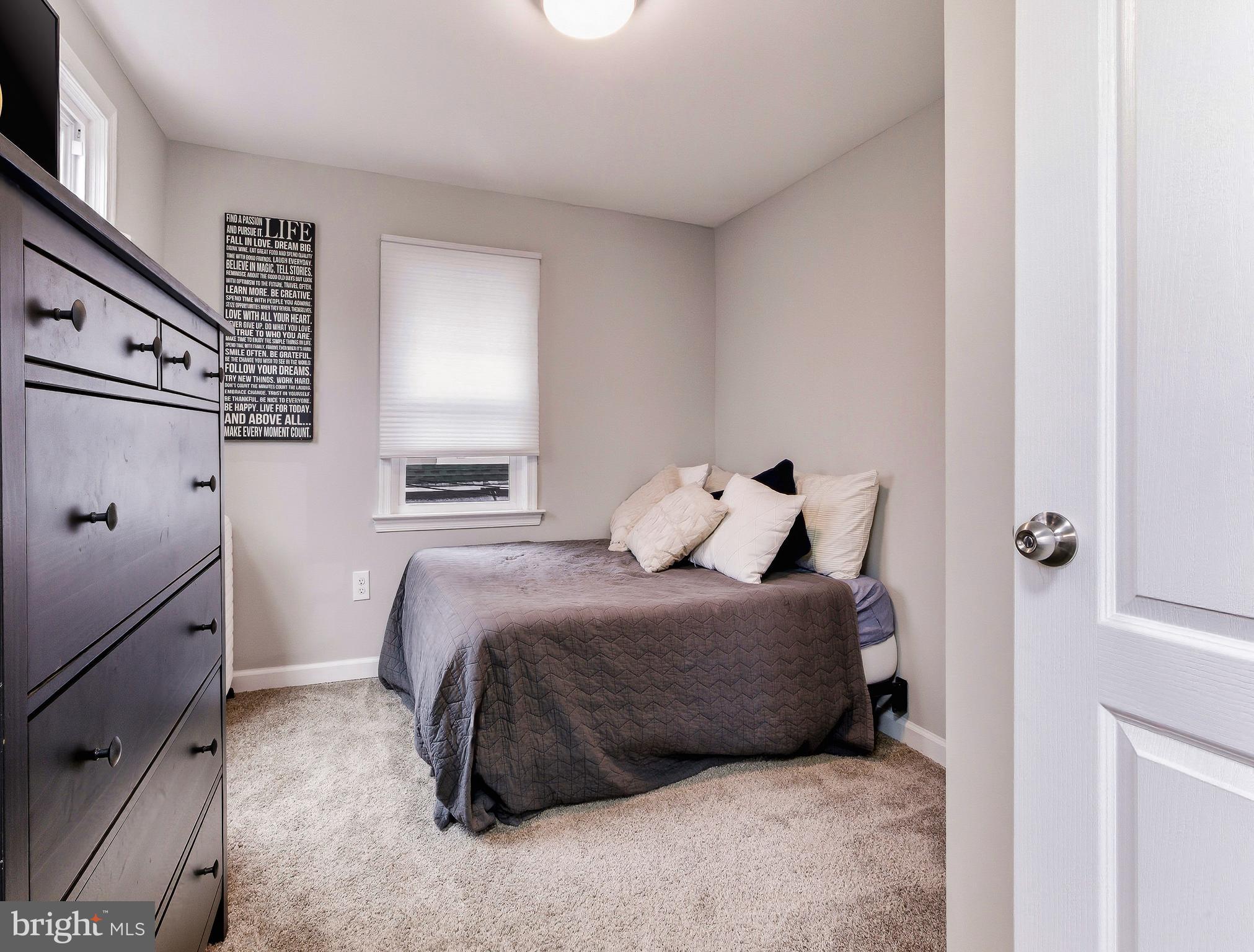 321 West Avenue Pitman, NJ 08071 - Photo 16 of 24 a bedroom with a bed and a window