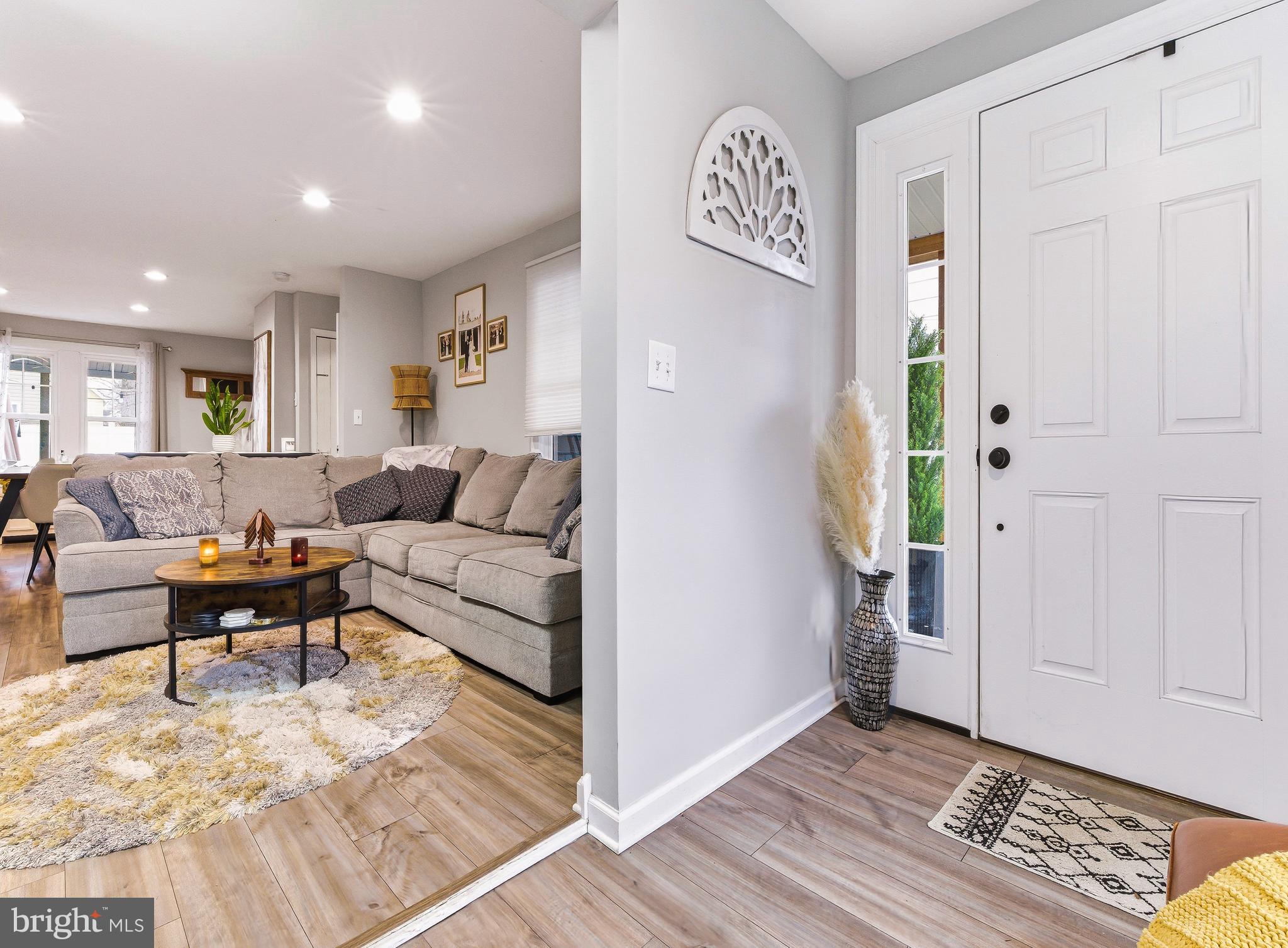 321 West Avenue Pitman, NJ 08071 - Photo 4 of 24 a living room with furniture and a rug