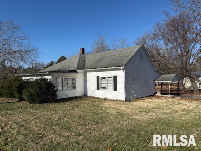 1112 McHaney Road Harrisburg, IL 62946 - Photo 1 of 27 a house view with a outdoor space