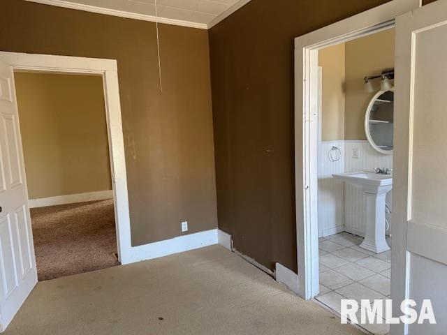 1112 McHaney Road Harrisburg, IL 62946 - Photo 12 of 27 a view of a bathroom from a hallway