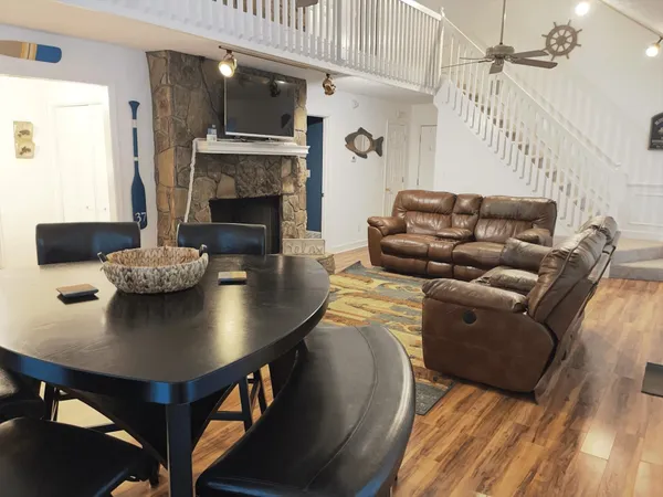 a dining room with furniture and window