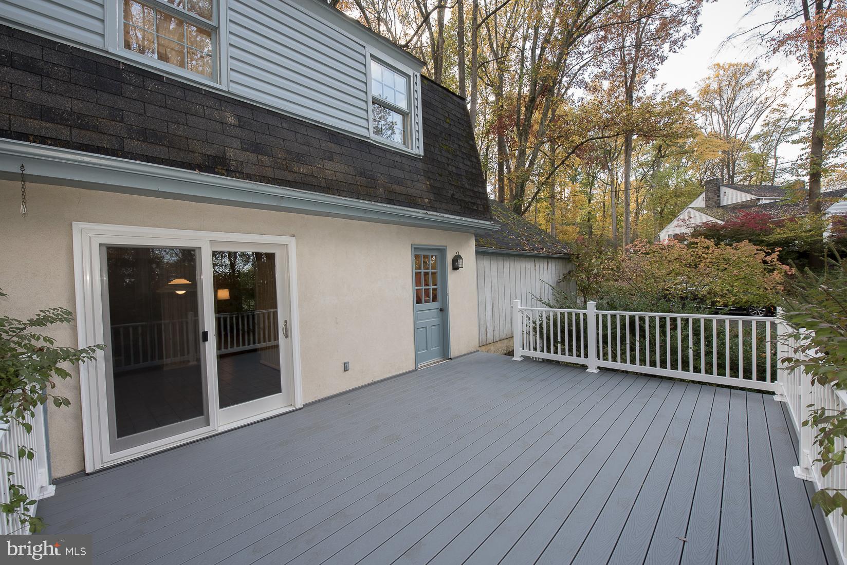 75 Pugh Road Wayne, PA 19087 - Photo 24 of 26 Deck with new sliding glass door and Mudroom door