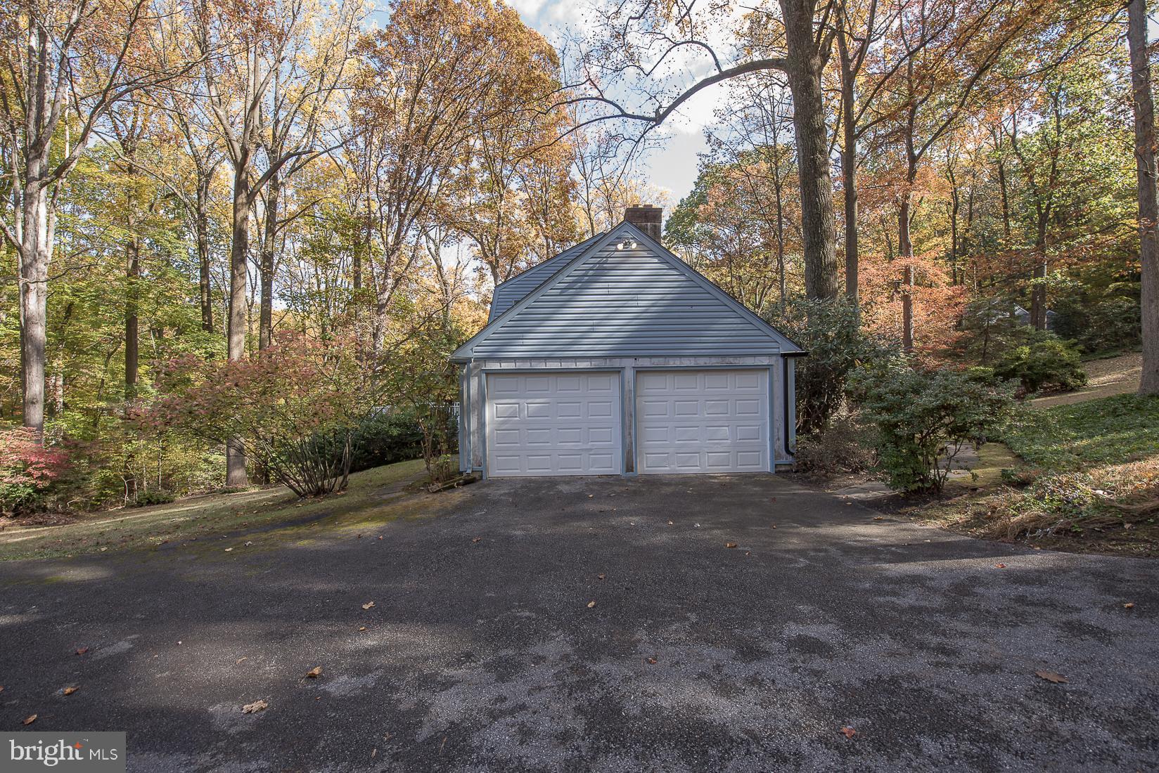 75 Pugh Road Wayne, PA 19087 - Photo 25 of 26 2-Car Attached Garage with spacious parking area