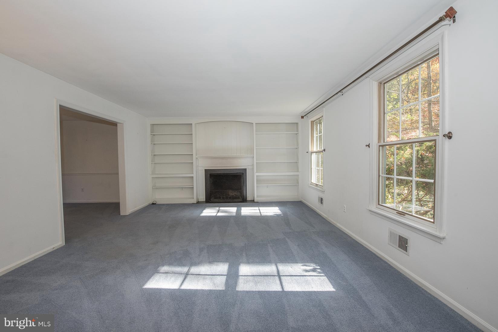 75 Pugh Road Wayne, PA 19087 - Photo 4 of 26 Living Room with wood burning fireplace