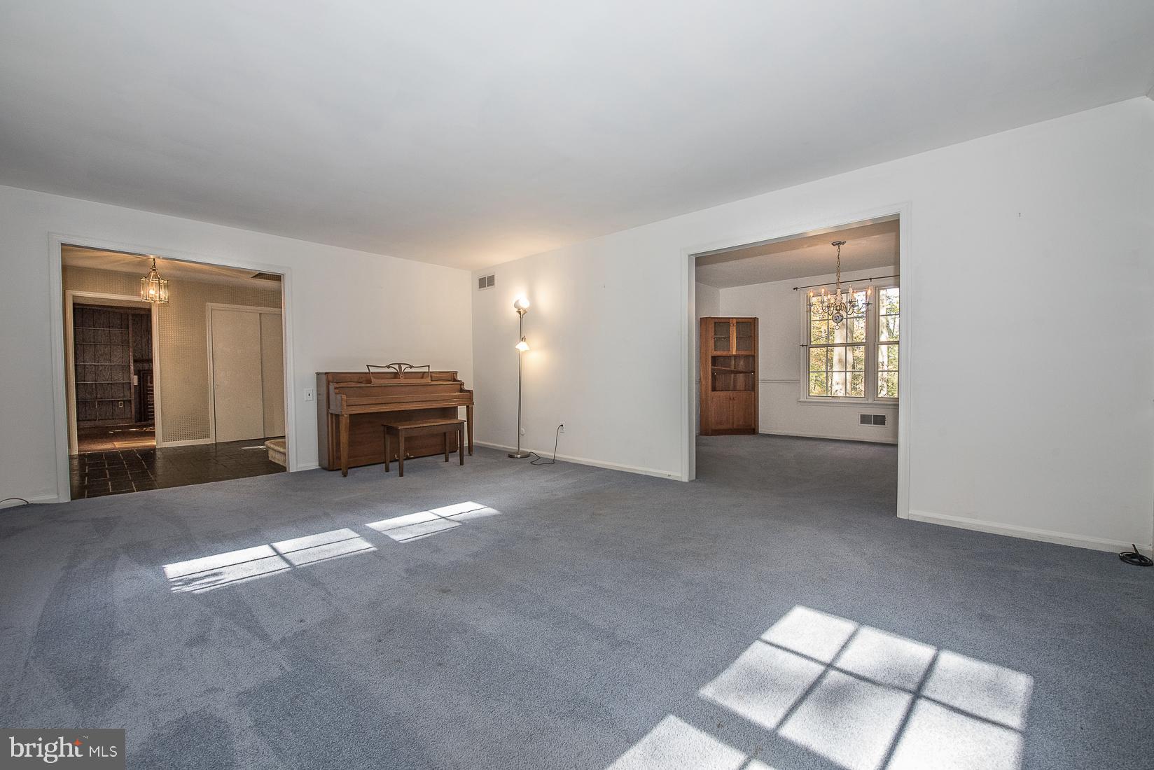 75 Pugh Road Wayne, PA 19087 - Photo 5 of 26 Living Room connecting to entrance foyer and DR