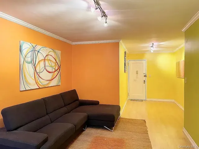 a living room with a couch and a table