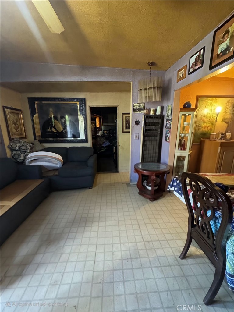 519 Williams Road Blythe, CA 92225 - Photo 8 of 10 a living room with furniture gym equipment and a flat screen tv