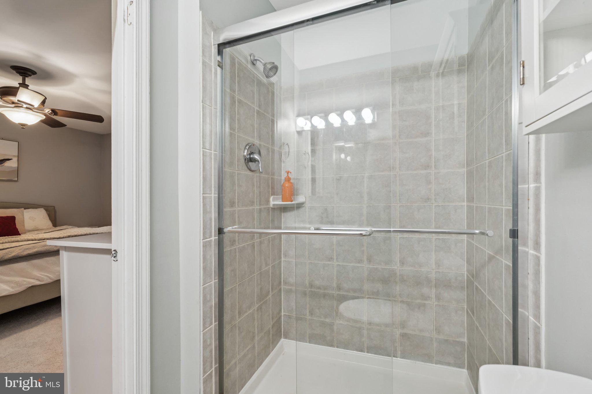 2408 Wanda Way Reston, VA 20191 - Photo 16 of 45 a bathroom with a shower and a sink