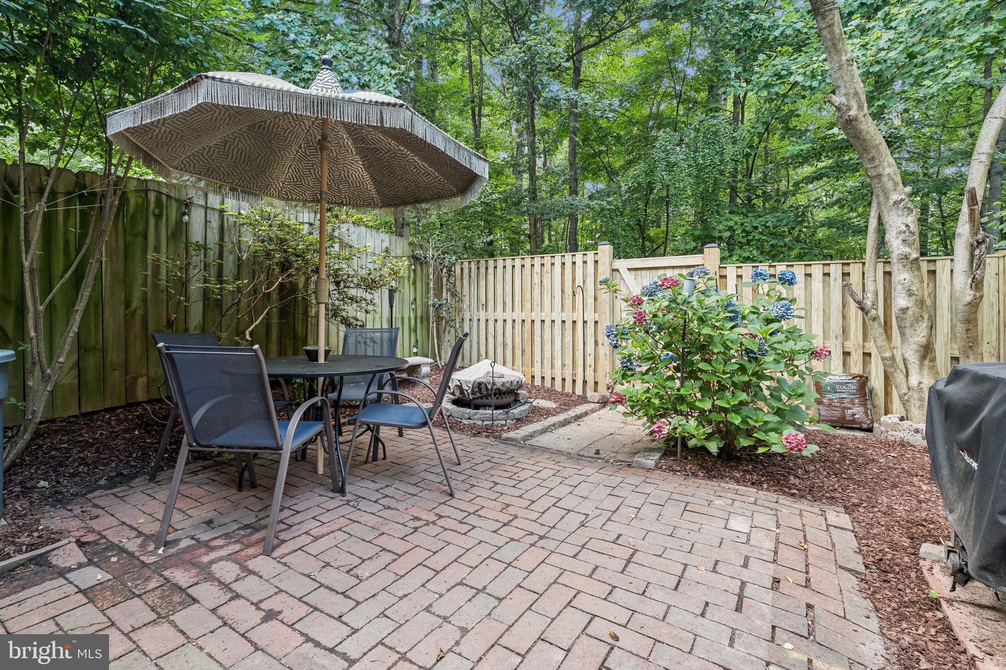 2408 Wanda Way Reston, VA 20191 - Photo 26 of 45 a garden view with a seating space