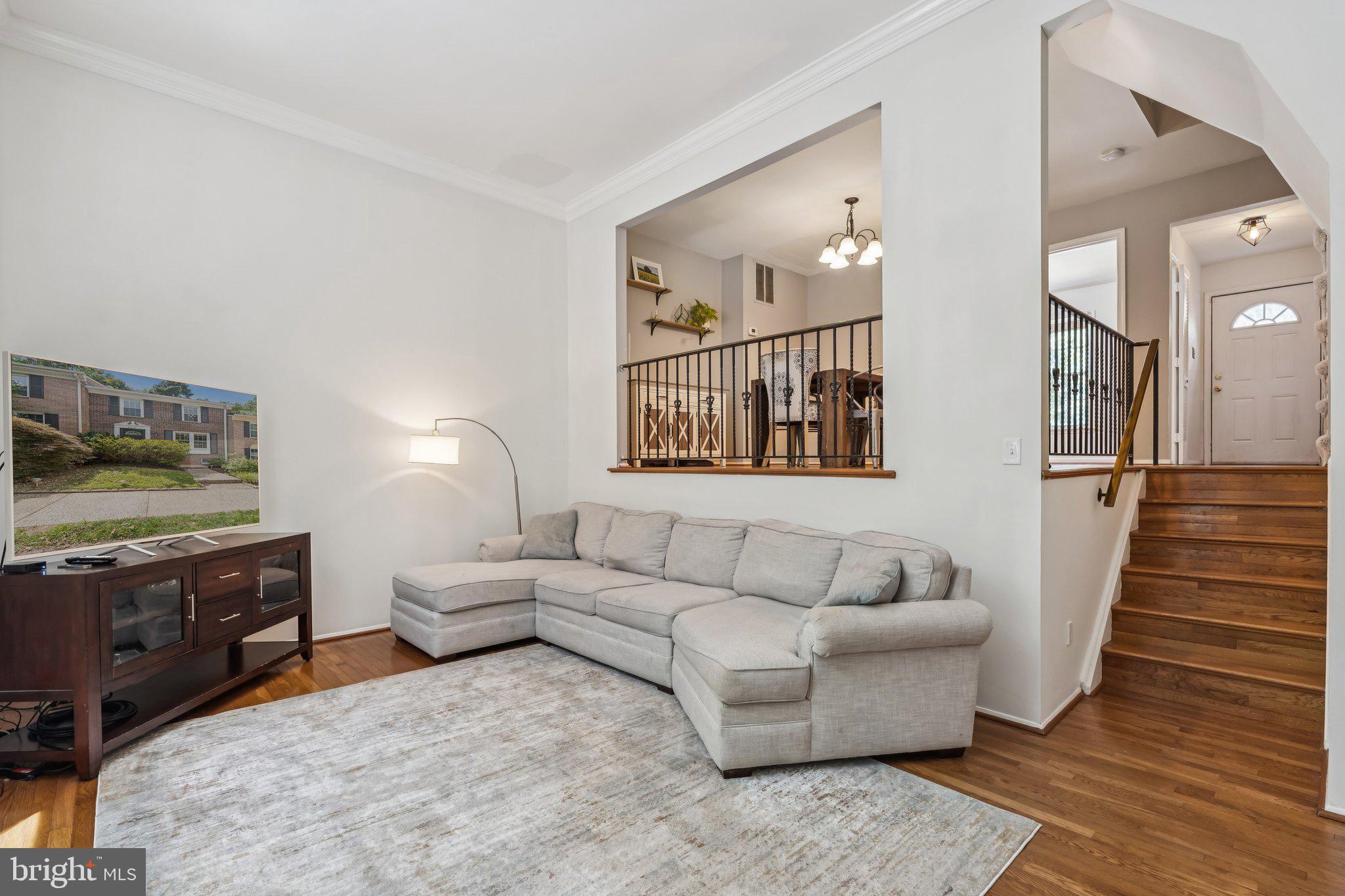2408 Wanda Way Reston, VA 20191 - Photo 10 of 45 a living room with furniture and wooden floor