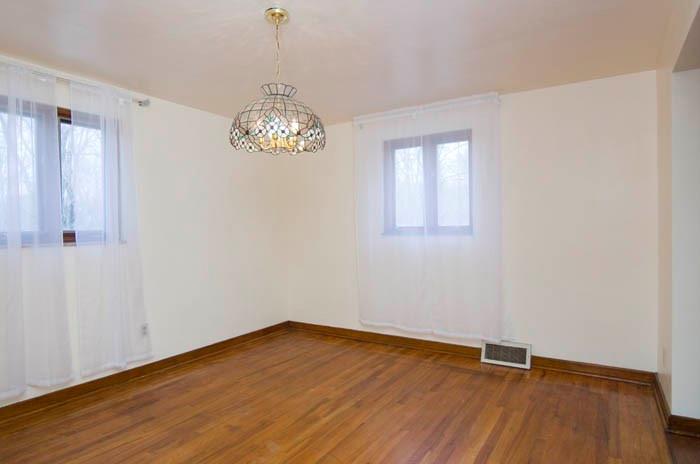 5006 Glenhurst Road Pittsburgh, PA 15207 - Photo 5 of 20 DINING ROOM W/HARDWOOD FLOORING & CHANDLIER