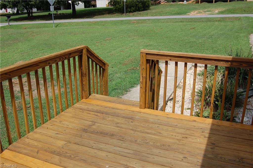 4301 Edgemore Road Greensboro, NC 27455 - Photo 13 of 19 Nice deck space for grilling and family time.
