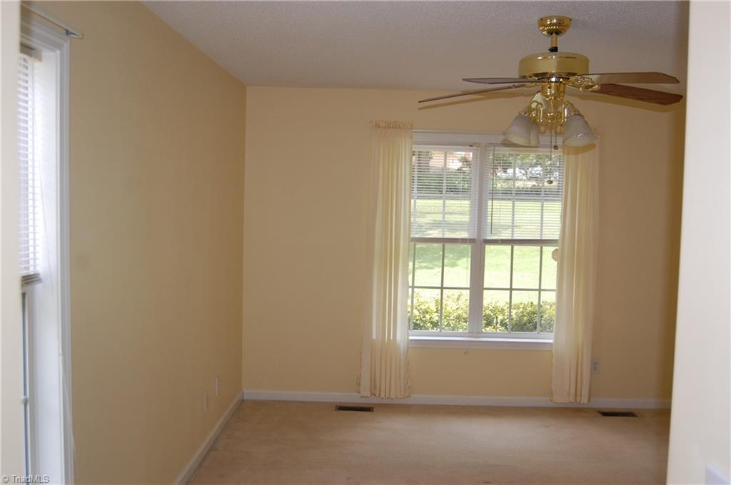 4301 Edgemore Road Greensboro, NC 27455 - Photo 17 of 19 Private MBR with large, updated walk - in closet plus linen closet with adjustable shelving. En Suite bath