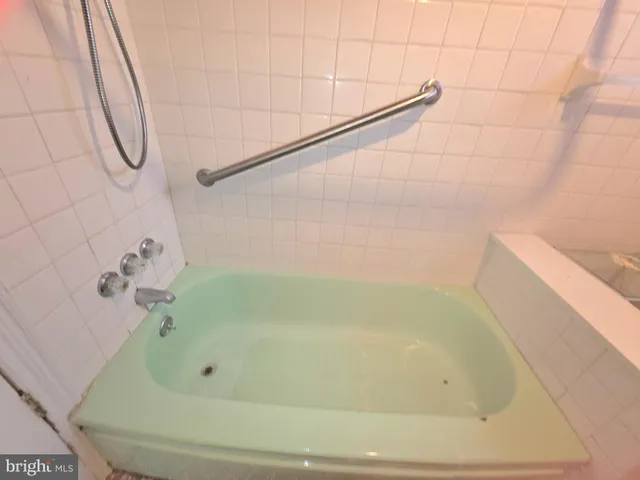 a bathroom with a bathtub