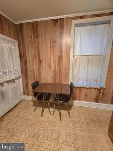 a blue and white kitchen with a sink