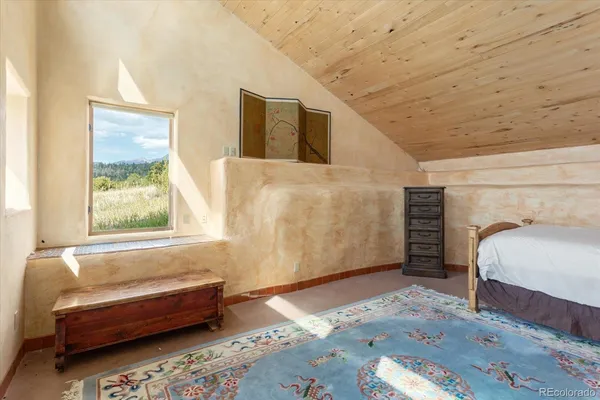 a room with furniture and a window