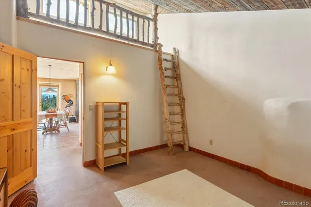 a bathroom with a sink mirror vanity and toilet