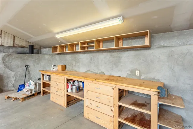 a couple of chairs that are sitting in the middle of a house