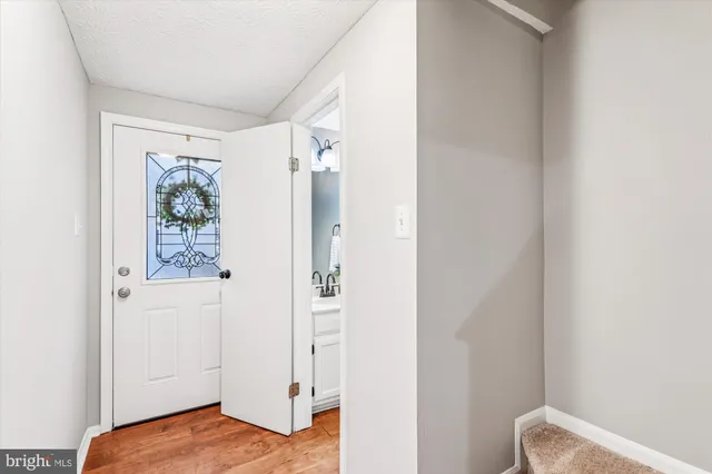 a view of walk in closet with window