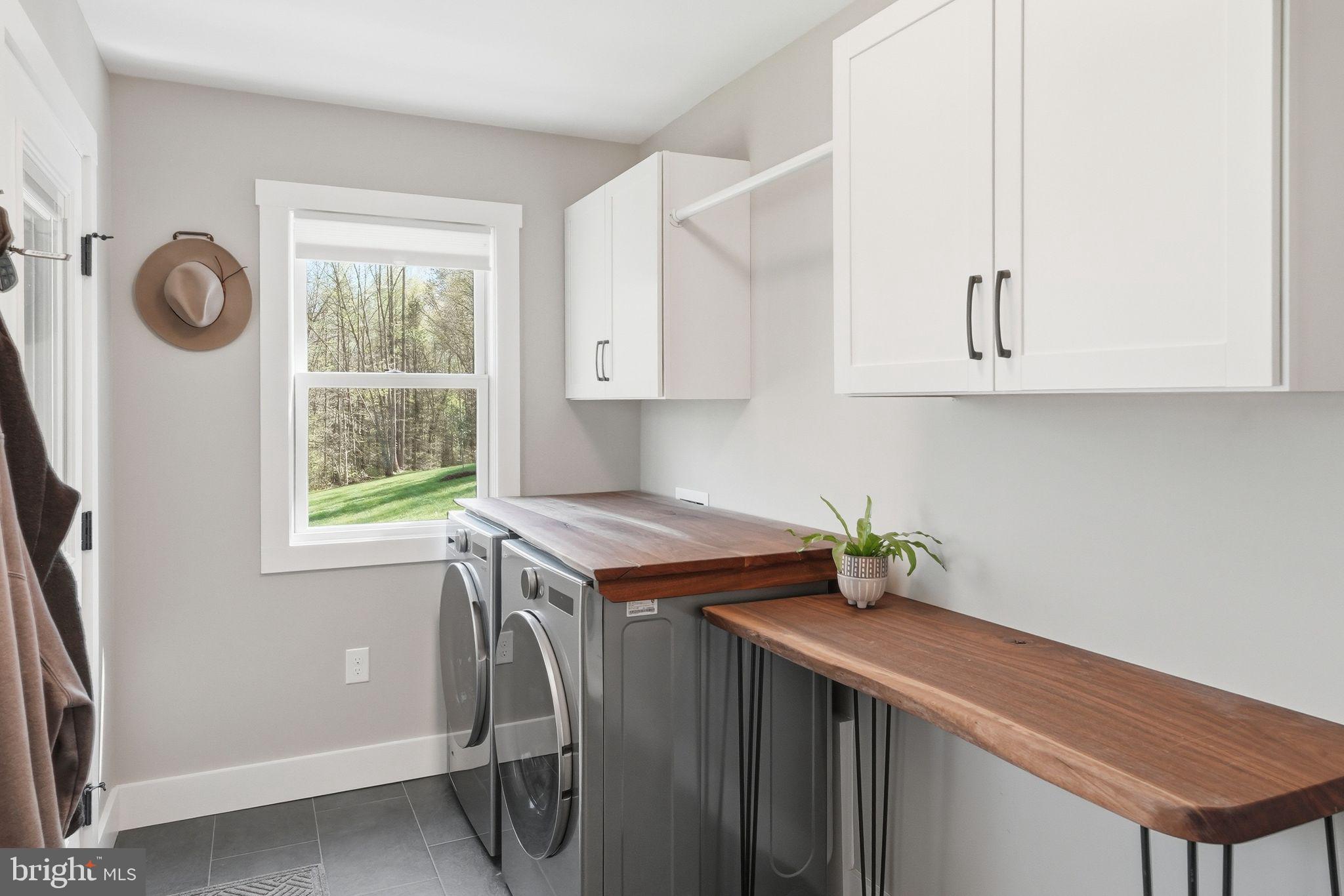 677 Weaver Hollow Road Banco, VA 22711 - Photo 24 of 34 Mudroom/laundry with custom walnut counters