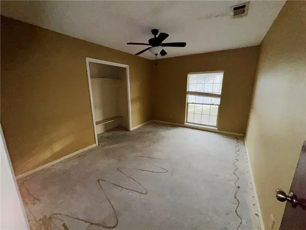 an empty room with windows