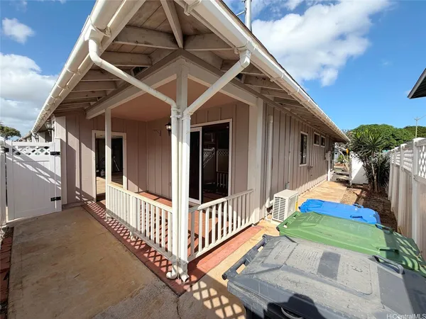 a view of a backyard of the house