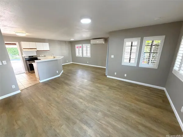a view of kitchen and windows