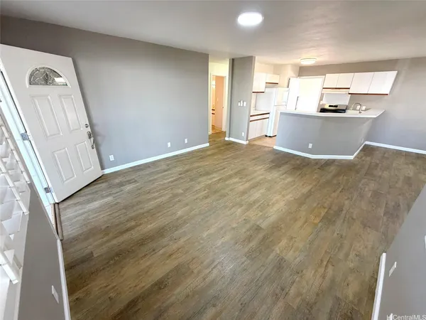 a view of a kitchen with a sink