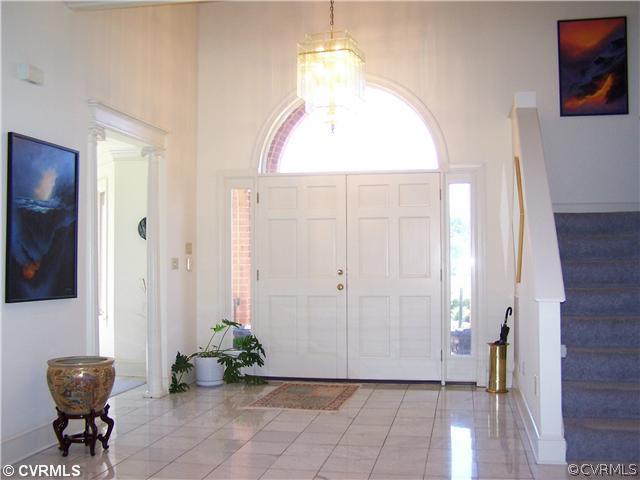 2360 Windy Run Road Manakin-Sabot, VA 23103 - Photo 3 of 12 a view of a hallway to a livingroom with furniture and windows