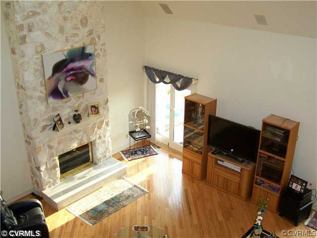 2360 Windy Run Road Manakin-Sabot, VA 23103 - Photo 5 of 12 a view of a workspace with furniture and a fireplace