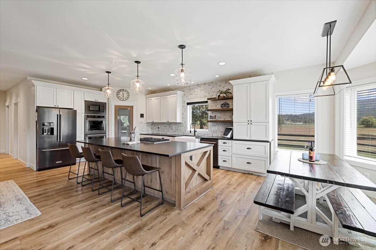 644 Masterson Road Cle Elum, WA 98922 - Photo 14 of 40 a large kitchen with lots of counter space and stainless steel appliances