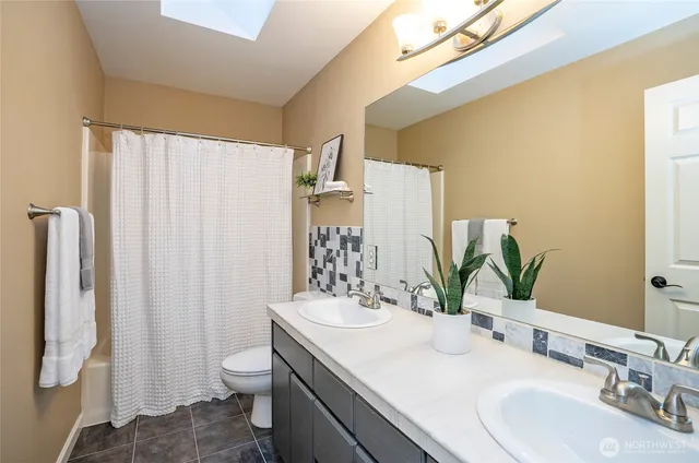 a room with a stove and a window