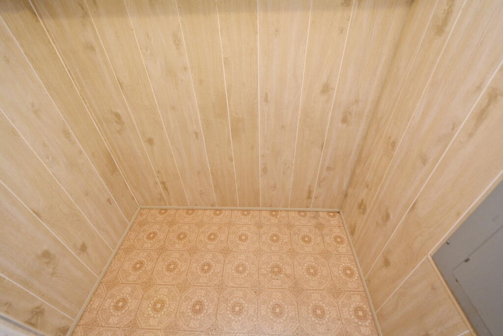 623 Periwinkle Circle Barefoot Bay, FL 32976 - Photo 20 of 37 a bathroom with a shower curtain