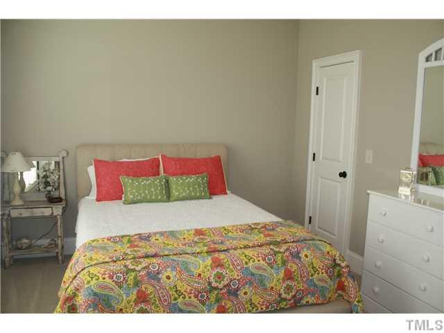 2812 Winter Song Road Raleigh, NC 27614 - Photo 13 of 24 This lovely first floor guest suite features a walk-in closet and separate vanity room with a private entrance to the hall bathroom. Room is tastefully decorated and ready for your personal touches and decor. Bedroom