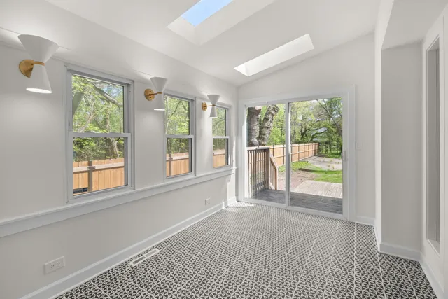 a view of a room with a large window