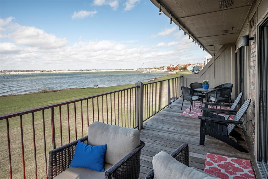 1860 Signal Ridge Place Rockwall, TX 75032 - Photo 1 of 1 a view of a balcony with furniture
