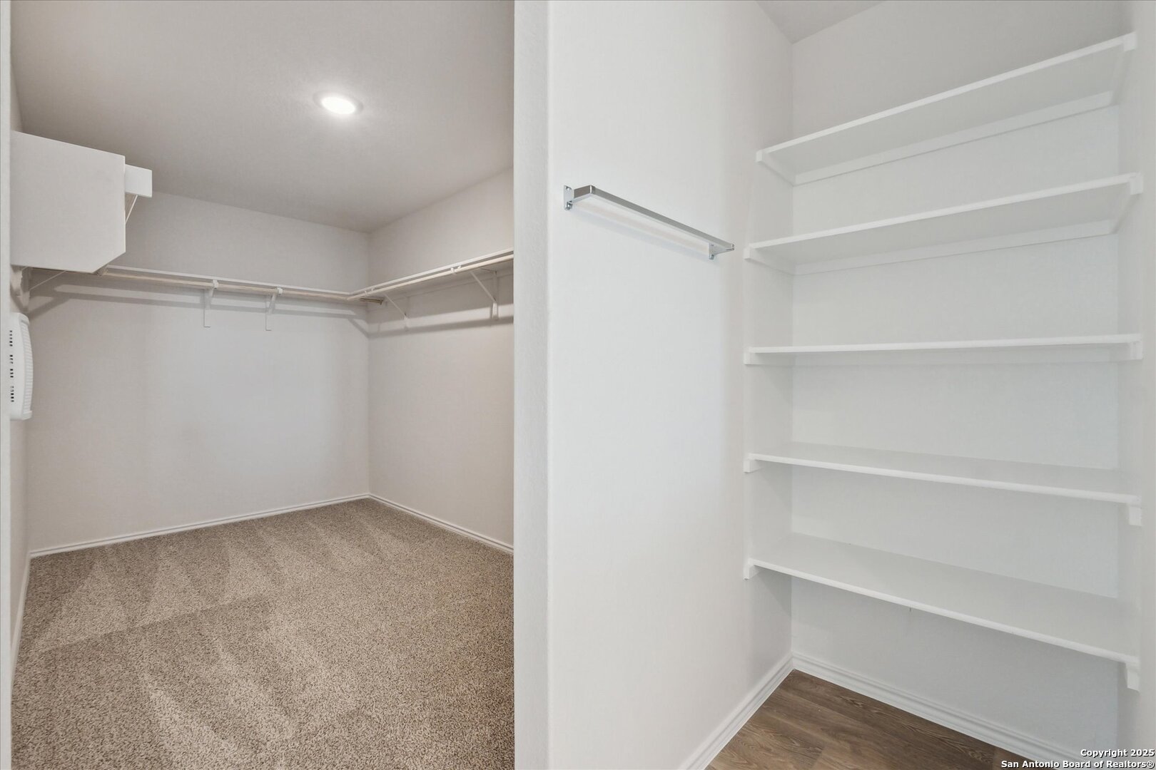 1632 Layne Loop New Braunfels, TX 78130 - Photo 22 of 34 a view of an empty walk in closet