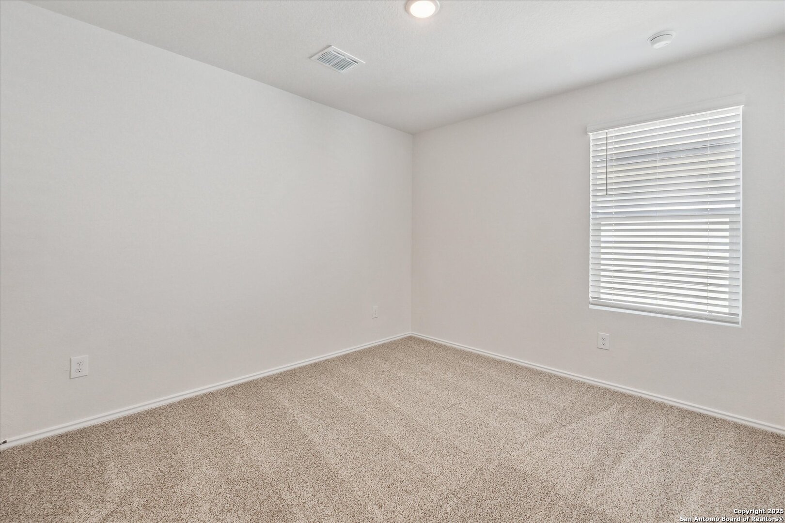 1632 Layne Loop New Braunfels, TX 78130 - Photo 27 of 34 an empty room with a window