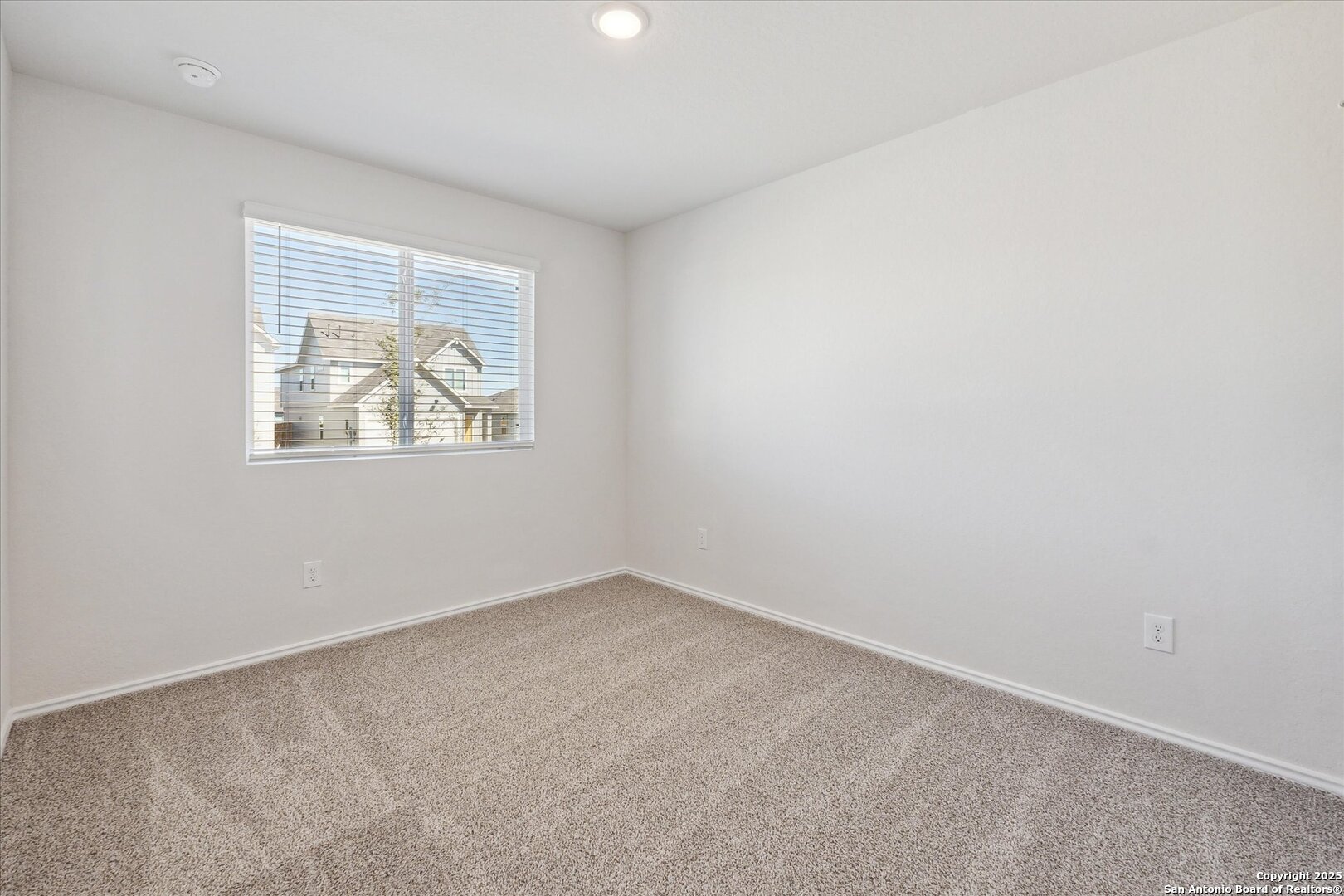 1632 Layne Loop New Braunfels, TX 78130 - Photo 8 of 34 an empty room with windows