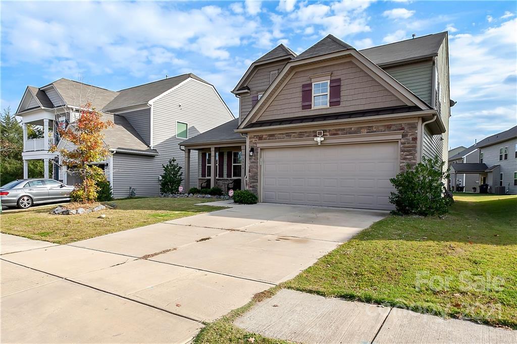 3016 Aransas Road Charlotte, NC 28214 - Photo 2 of 24 a front view of a house with garden