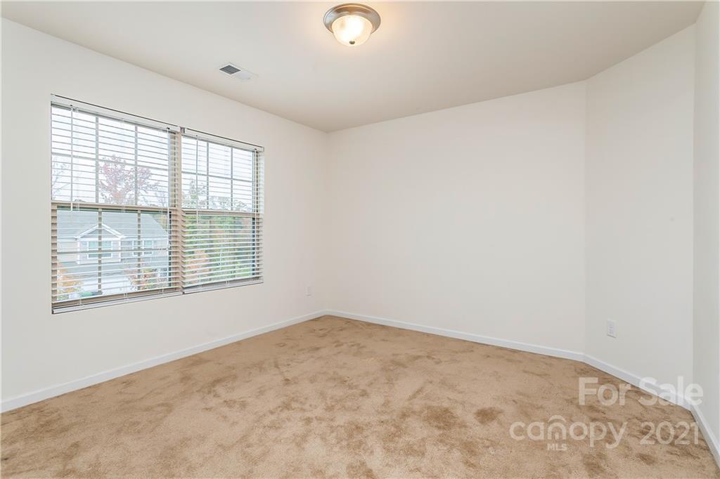 3016 Aransas Road Charlotte, NC 28214 - Photo 16 of 24 an empty room with a window