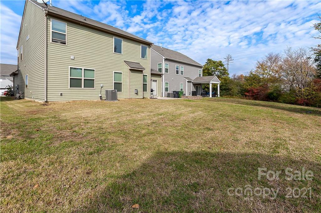 3016 Aransas Road Charlotte, NC 28214 - Photo 22 of 24 a view of a house with backyard and garden