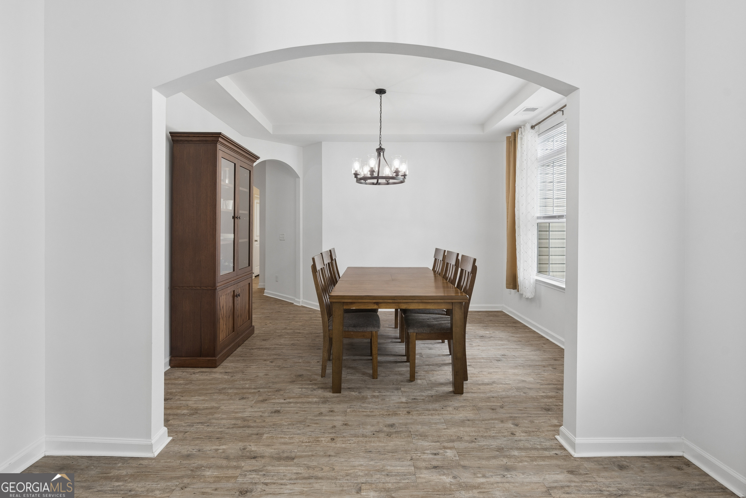 369 Waybridge Way Richmond Hill, GA 31324 - Photo 25 of 40 a view of a dining room with furniture and window