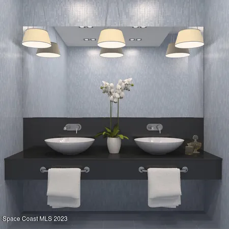 a bathroom with a double vanity sink toilet and shower