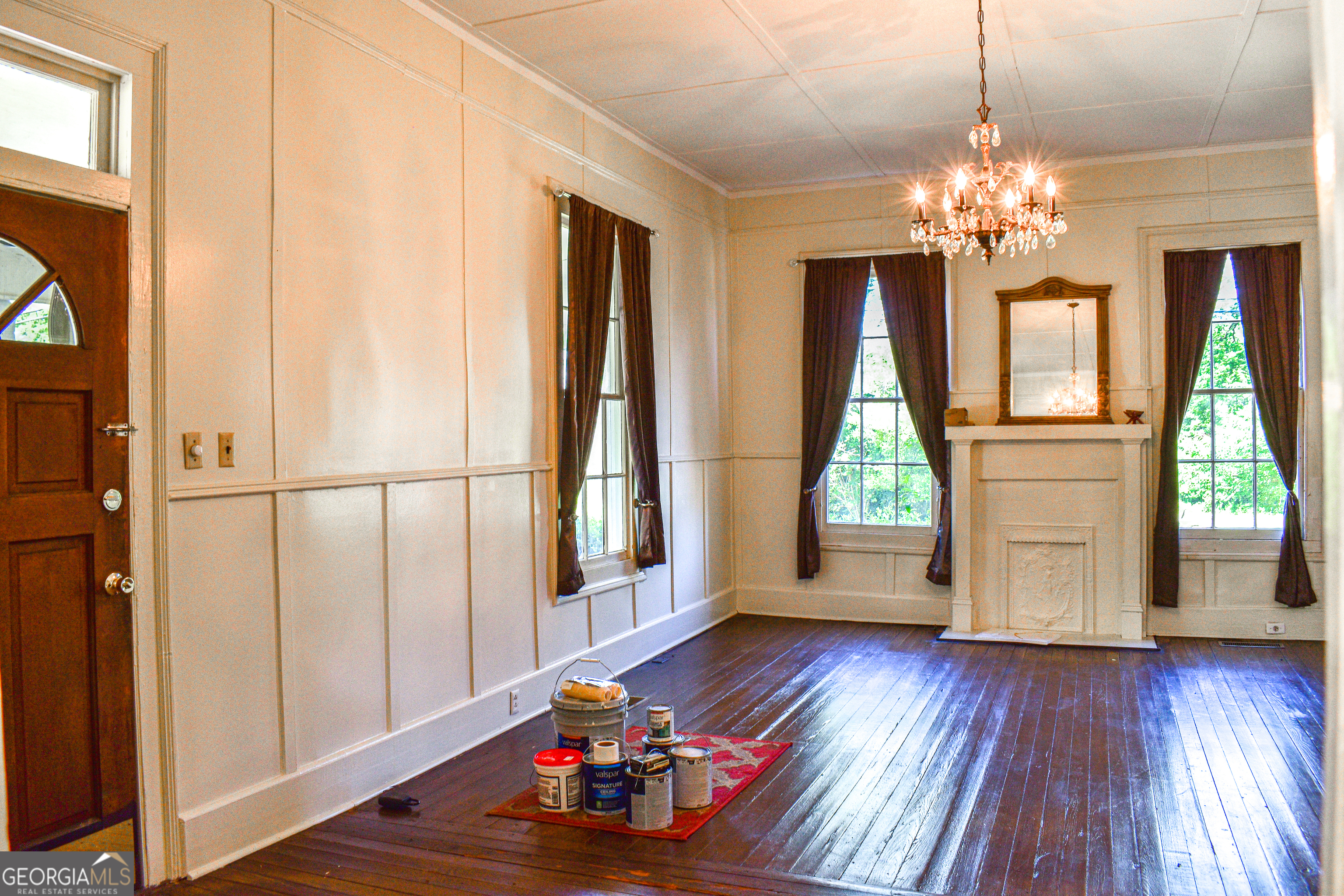 100 Minor Avenue Montezuma, GA 31063 - Photo 13 of 43 a very nice looking room with wooden floor and a large window