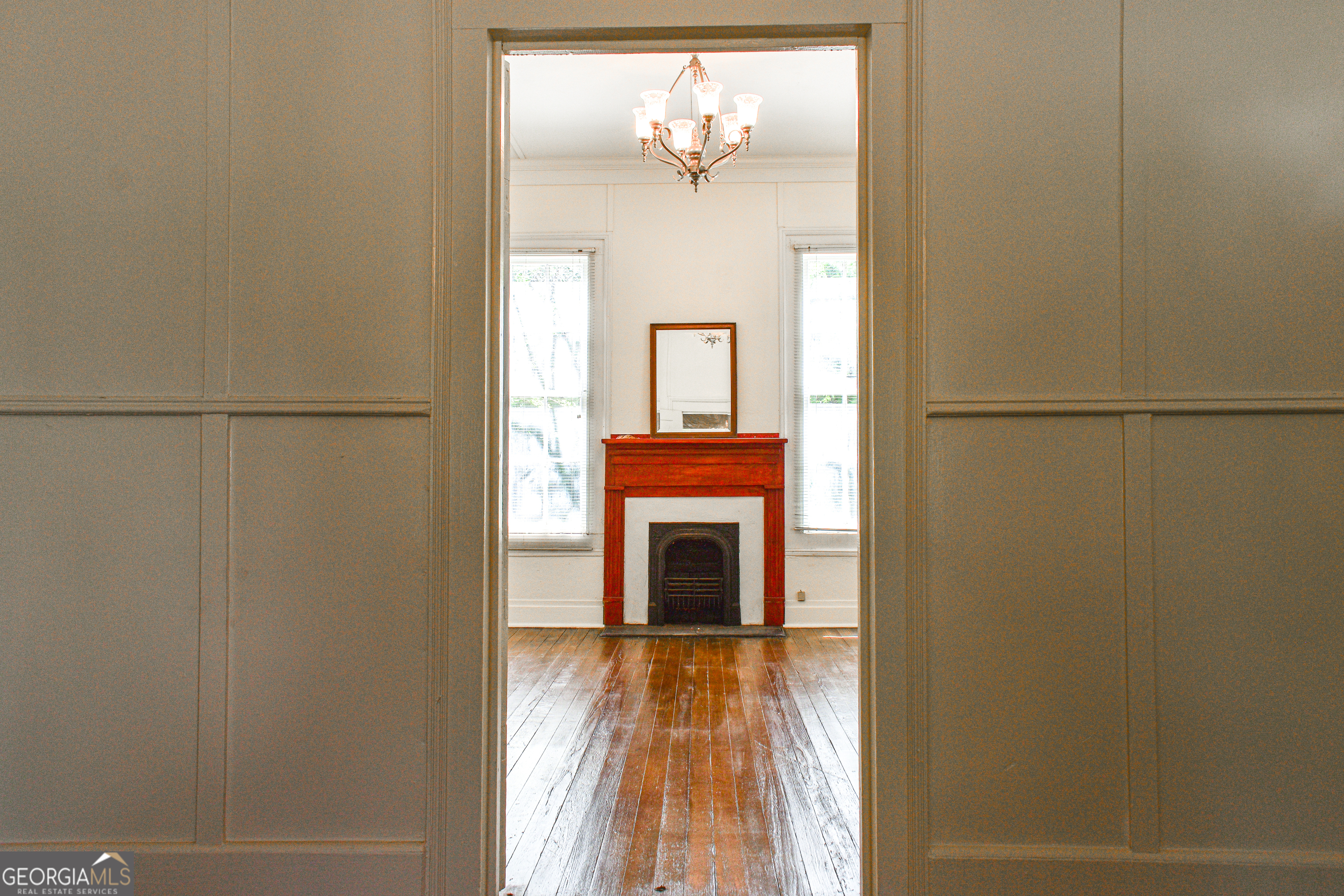 100 Minor Avenue Montezuma, GA 31063 - Photo 14 of 43 a view of a hallway with wooden floor and a cabinet