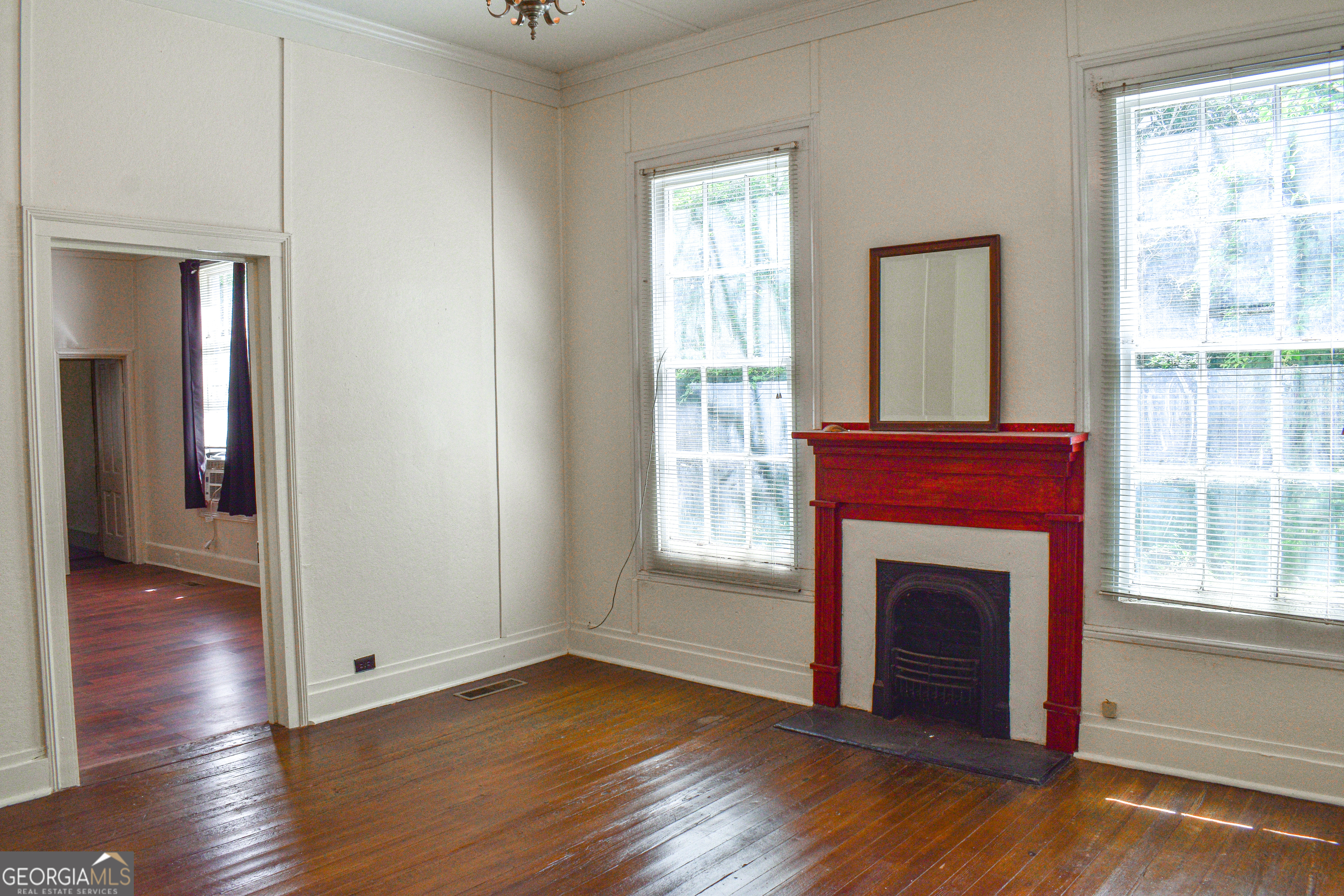 100 Minor Avenue Montezuma, GA 31063 - Photo 16 of 43 a view of a livingroom with a fireplace and window